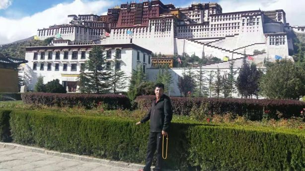 An undated photo of Lhadar on a pilgrimage trip to the Potala Palace in Lhasa.